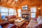 Living Room Features Ample Seating, Gas Fireplace, Flat Screen TV